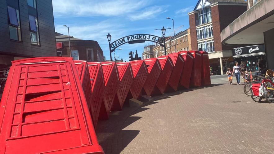Phone box sculpture in Kingston town centre