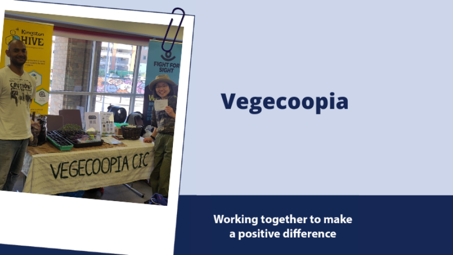 Vegcoopia CIC volunteers and stall 