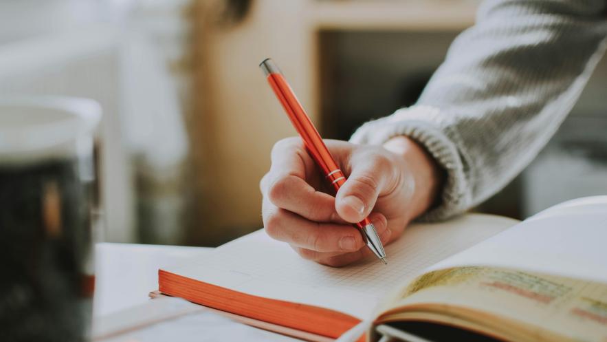 Close of someone taking notes